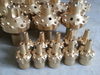 Top hammer rock drilling tools button bits
