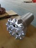 Top hammer rock drilling tools button bits
